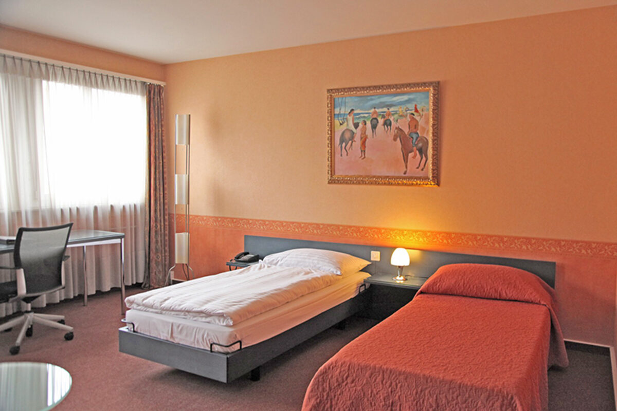Chambre de l'hôtel Comédie, entreprise sociale de T-Interactions à Genève
